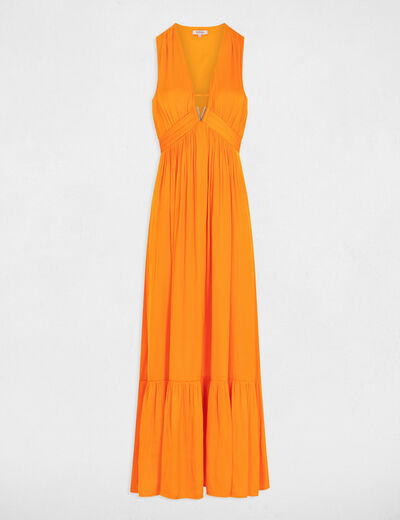 Lange soepelvallende jurk oranje vrouw