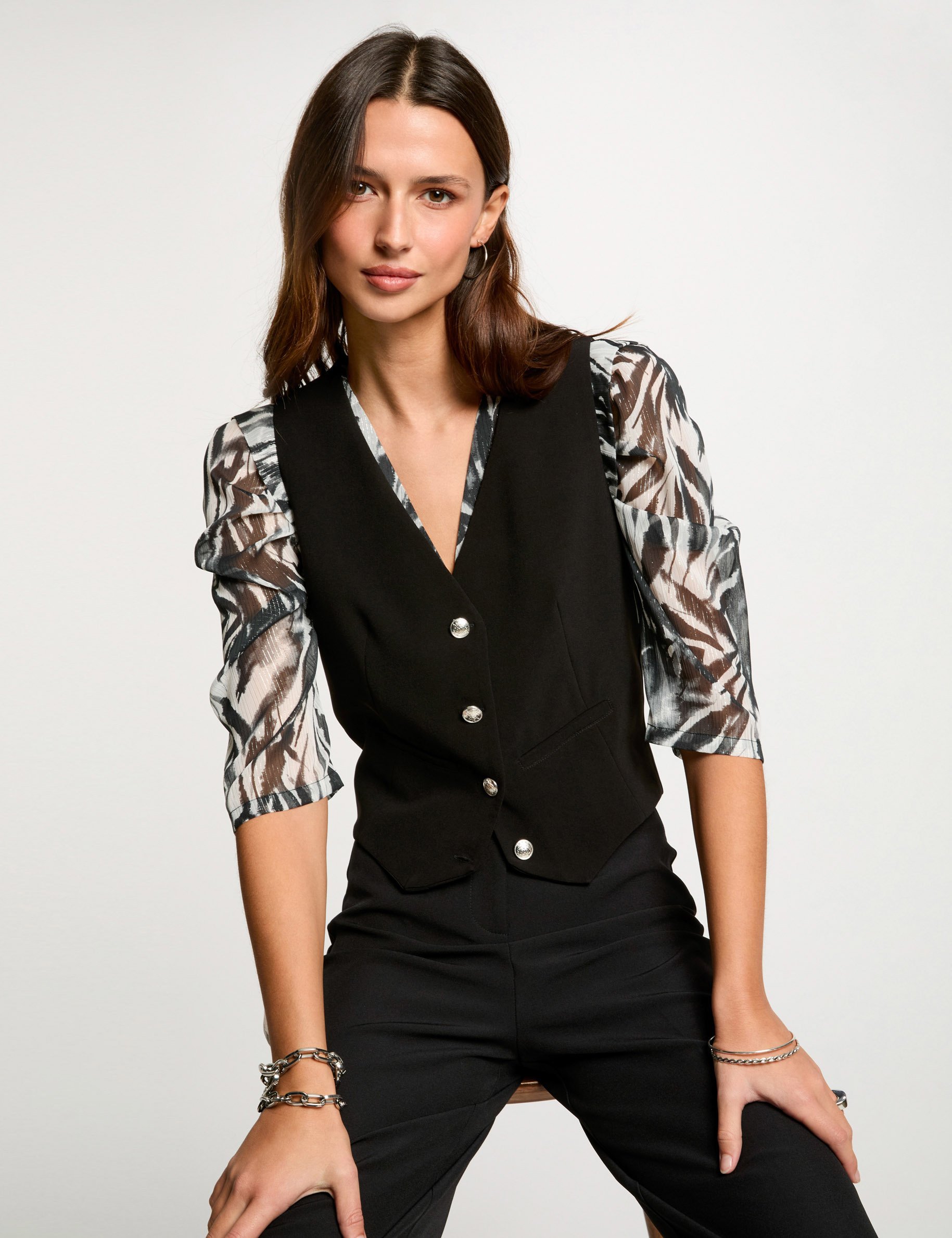 Top sans manches boutonné noir femme