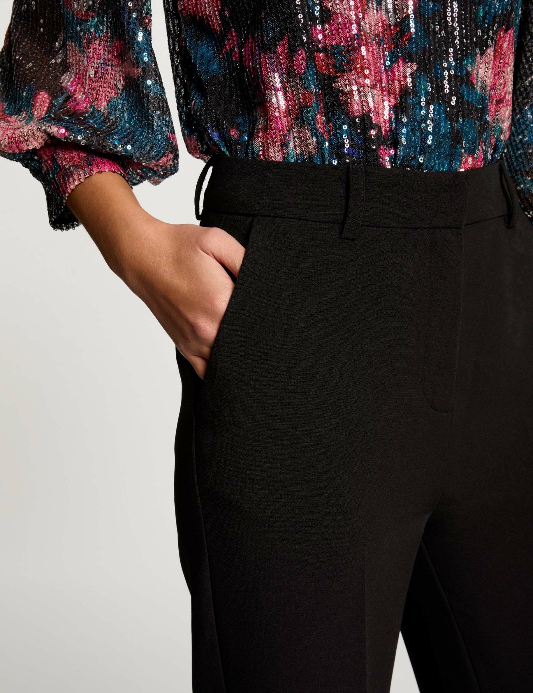 Pantalon ajusté à pinces noir femme