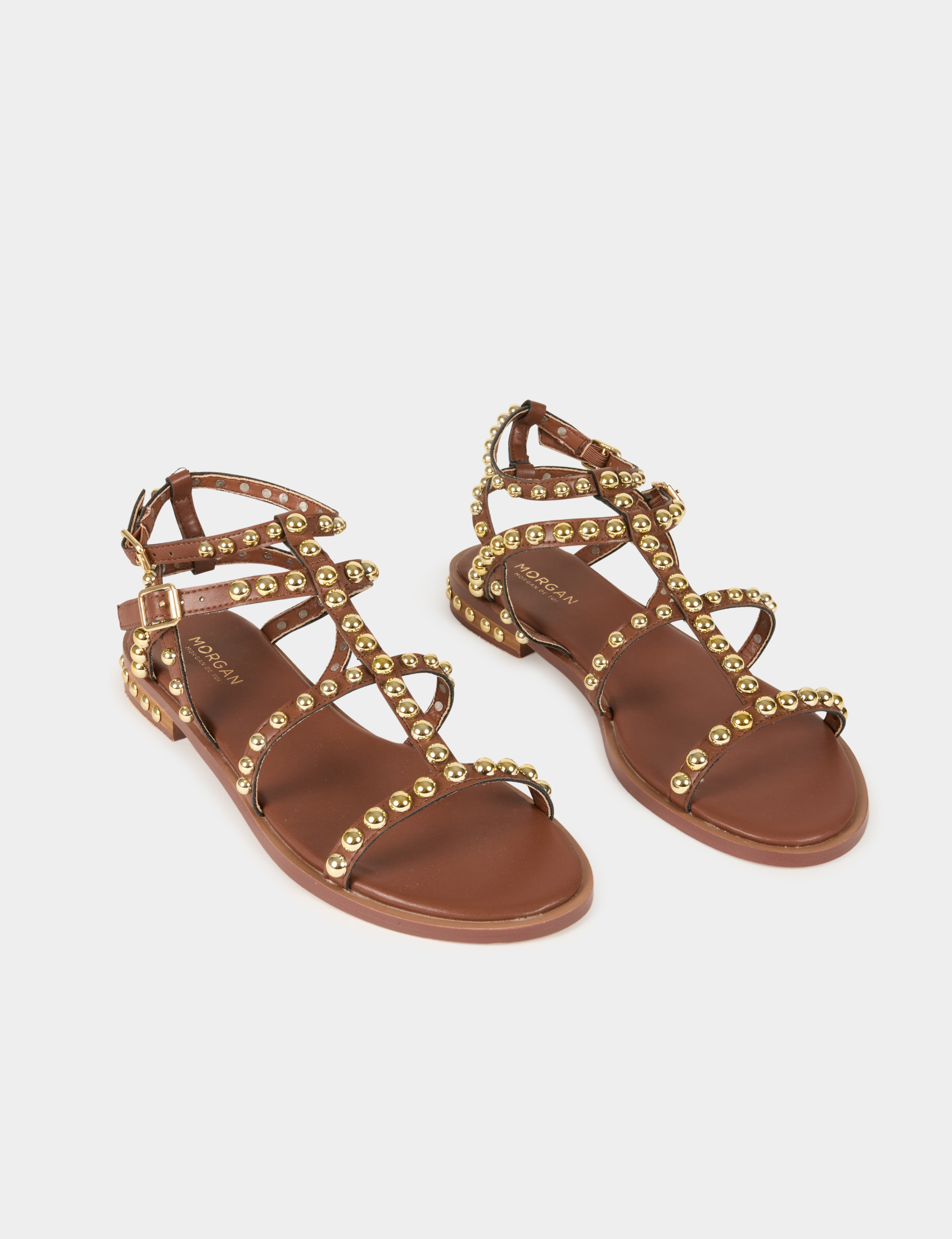 Platte sandalen met studs bruin vrouw