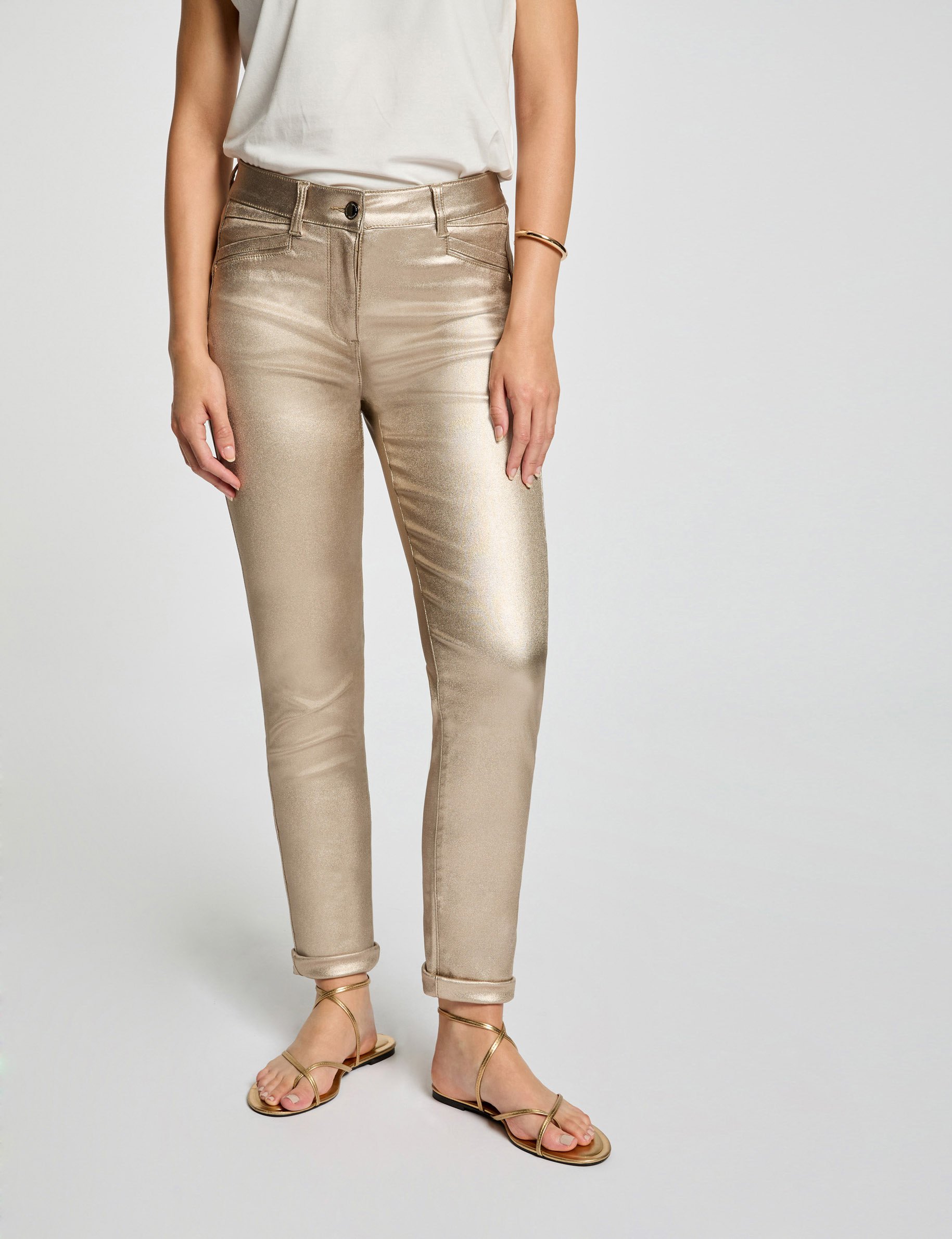 Pantalon ajusté enduit dore femme