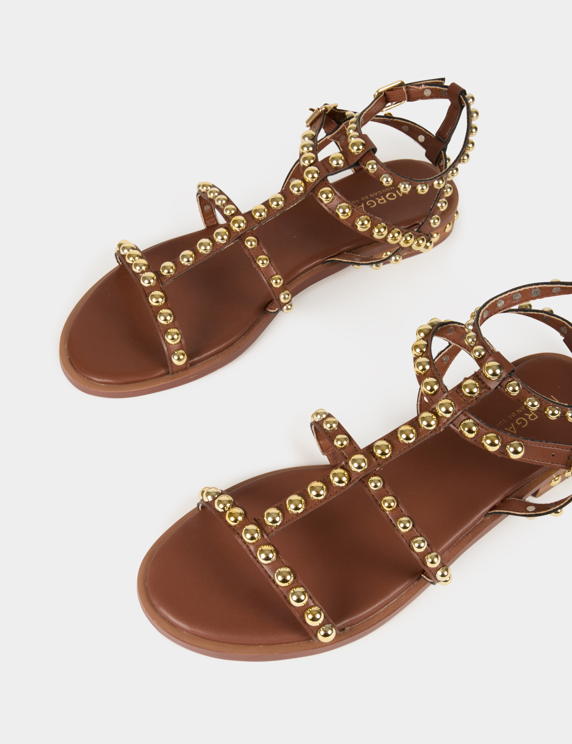 Platte sandalen met studs bruin vrouw